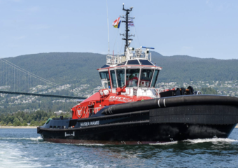 A tugboat travelling in the ocean.